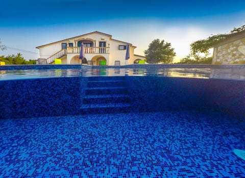 Property building, Swimming pool, Sunset