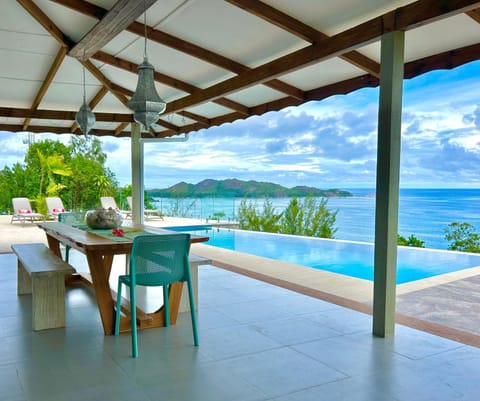 Property building, Natural landscape, View (from property/room), Balcony/Terrace, Balcony/Terrace, Dining area, Pool view, Sea view, Swimming pool
