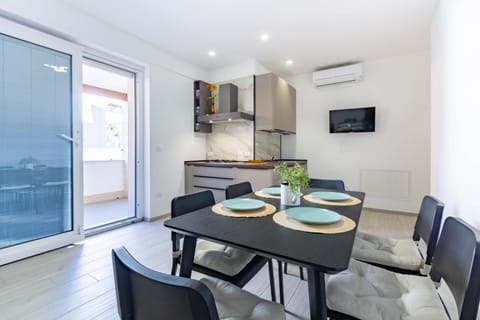 Kitchen or kitchenette, Living room, Dining area, stove, air conditioner