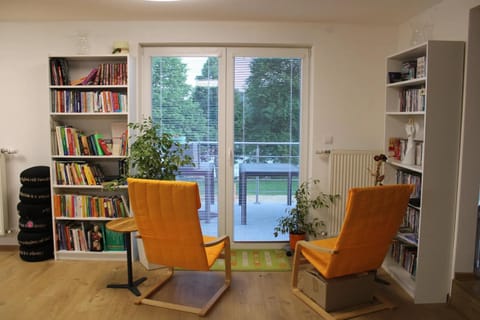 Property building, Communal lounge/ TV room, Library, Balcony/Terrace, Living room, Spa and wellness centre/facilities, Seating area