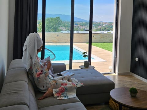 Day, Living room, Seating area, Pool view, Swimming pool
