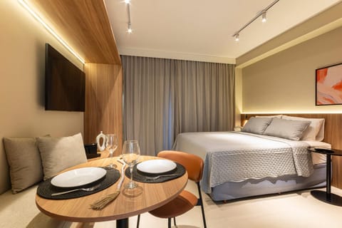 Bed, TV and multimedia, Living room, Photo of the whole room, Seating area, Bedroom