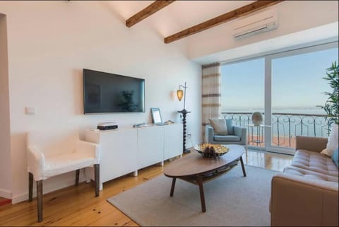 TV and multimedia, View (from property/room), Living room, Seating area, air conditioner