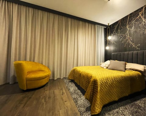 Bed, Seating area, Bedroom