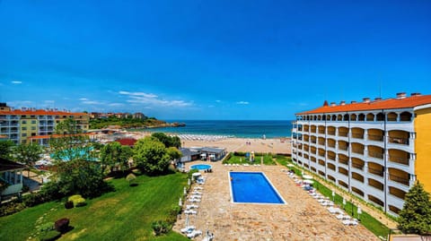 Property building, Natural landscape, Beach, Pool view, Sea view, Swimming pool