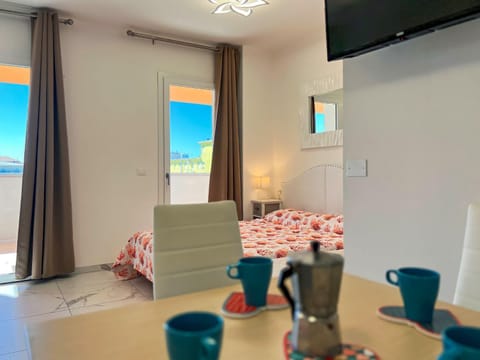 Restaurant/places to eat, Communal lounge/ TV room, Bed, TV and multimedia, View (from property/room), Balcony/Terrace, Dining area, Bedroom