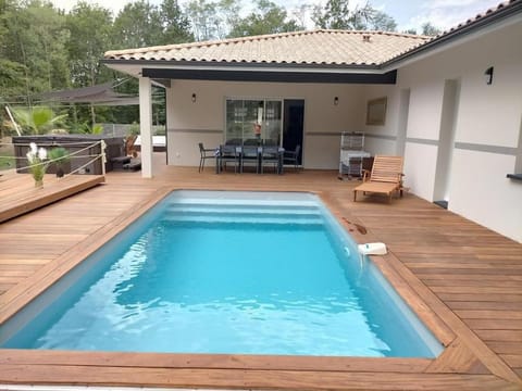 Property building, Patio, Pool view, Swimming pool, Swimming pool, sunbed