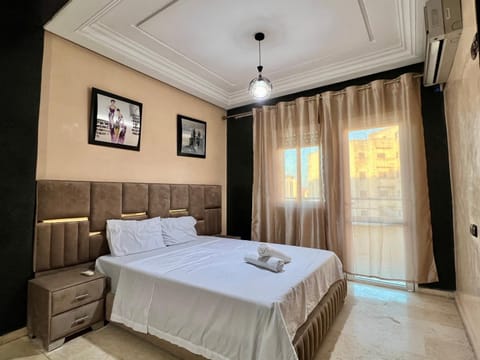 Bed, Photo of the whole room, Bedroom, towels, air conditioner
