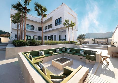 Property building, Patio, Day, Natural landscape, View (from property/room), Balcony/Terrace, Living room, Seating area, Mountain view, Pool view, Swimming pool, sunbed