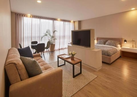 Bed, TV and multimedia, Living room, Photo of the whole room, Seating area, Dining area, Bedroom