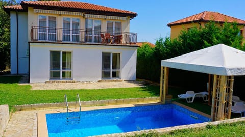 Property building, Patio, Day, Garden, Garden view, Pool view, Swimming pool