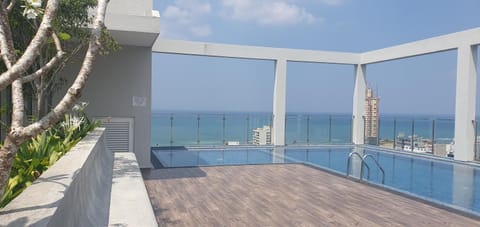 Patio, Day, Natural landscape, View (from property/room), Pool view, Sea view, Swimming pool, sunbed