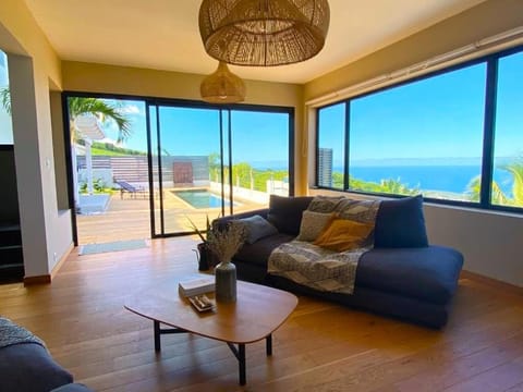 Communal lounge/ TV room, Day, Natural landscape, View (from property/room), Living room, Seating area, Mountain view, Sea view