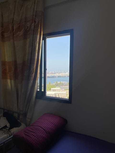 Ladies sharing Room beside Dubai station Apartment in Al Sharjah