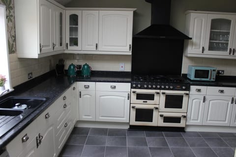 Kitchen or kitchenette, stove, toaster