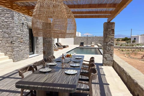 Property building, Patio, Balcony/Terrace, Seating area, Dining area, Pool view, Swimming pool, sunbed