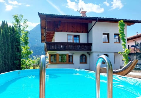 Property building, Swimming pool, sunbed