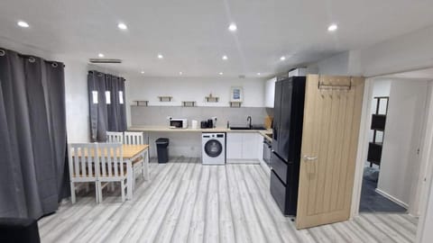 Kitchen or kitchenette, Living room, Seating area, oven, wardrobe, washing machine