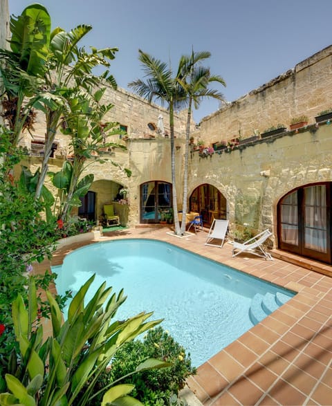 Swimming pool, sunbed