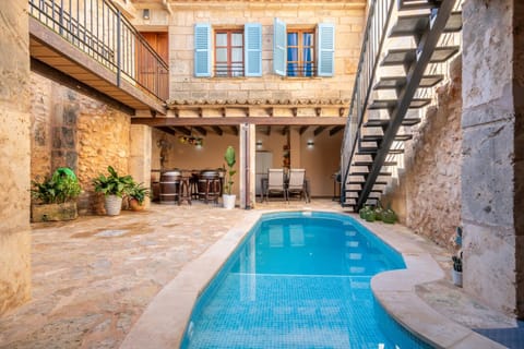 Property building, Living room, Swimming pool