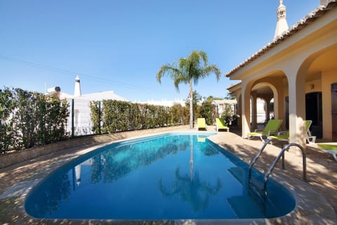Property building, Living room, Swimming pool