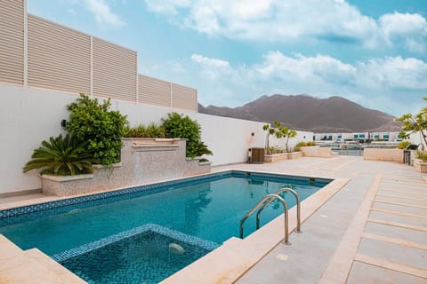 Nearby landmark, Day, Natural landscape, Mountain view, Pool view, Swimming pool, sunbed