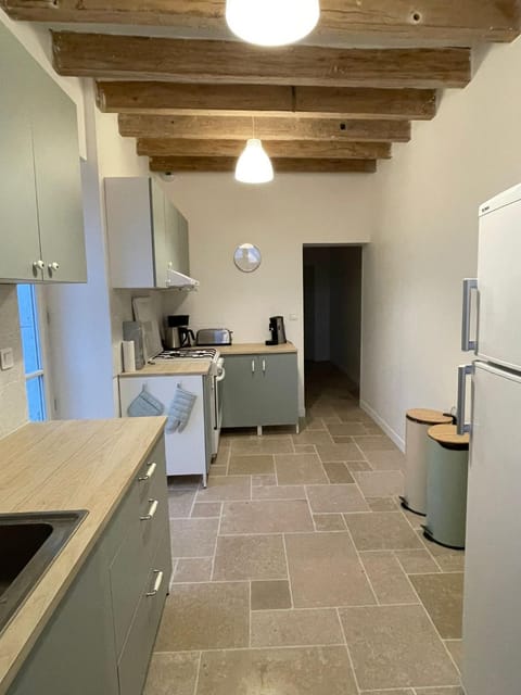 Kitchen or kitchenette, dishwasher, oven, stove, toaster