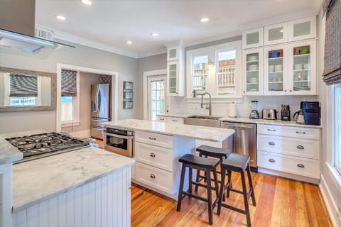 Kitchen or kitchenette, dishwasher, oven, stove, toaster