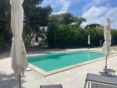 Swimming pool, sunbed