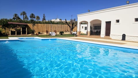 Property building, Living room, Swimming pool
