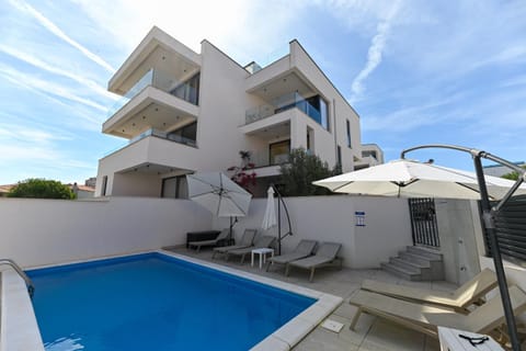 Property building, View (from property/room), Swimming pool, sunbed