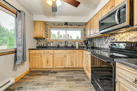 Canal-Front Cabin Dock and Fire Pit in New Lisbon Cabin in Wisconsin