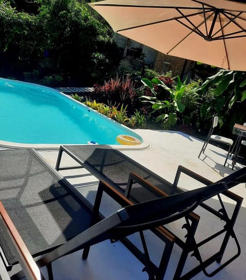 Swimming pool, sunbed