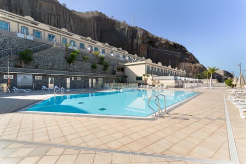 Property building, Living room, Swimming pool