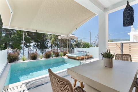 Property building, Living room, Swimming pool