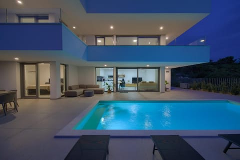 Property building, Night, Swimming pool