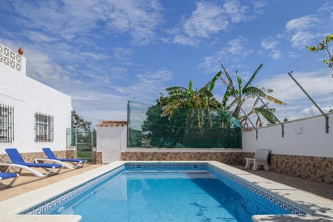 Property building, Living room, Swimming pool