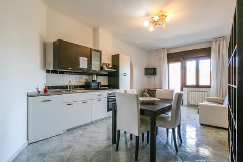 Kitchen or kitchenette, Living room, Seating area, Dining area, dishwasher, oven, stove