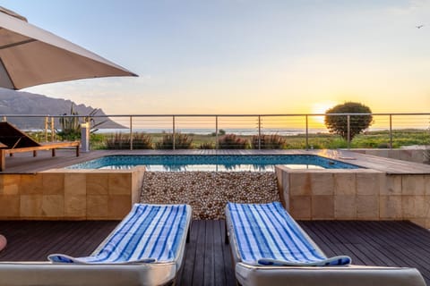 Patio, Natural landscape, View (from property/room), Swimming pool, Sunset, sunbed