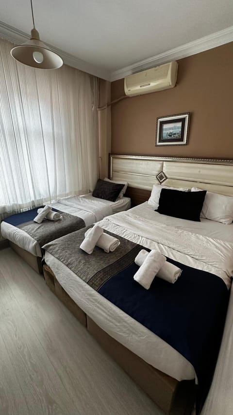 Bed, Photo of the whole room, Bedroom, towels, air conditioner