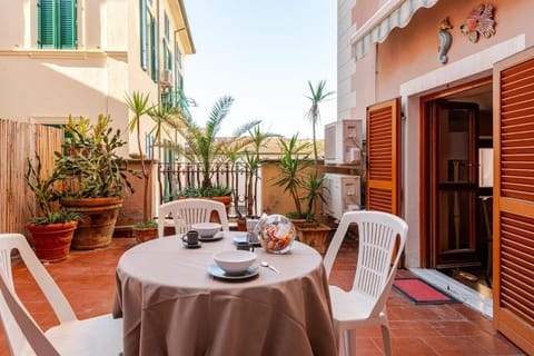 Property building, Patio, Day, View (from property/room), Balcony/Terrace, Living room, Seating area, Dining area