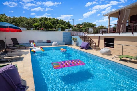Property building, Patio, View (from property/room), Balcony/Terrace, Pool view, Swimming pool, sunbed