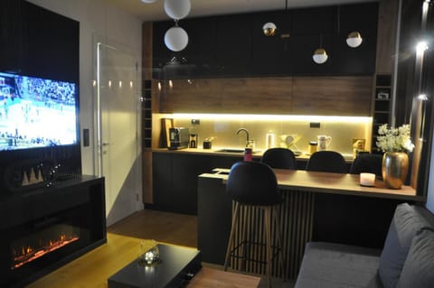 Living room, Dining area, fireplace, kitchen