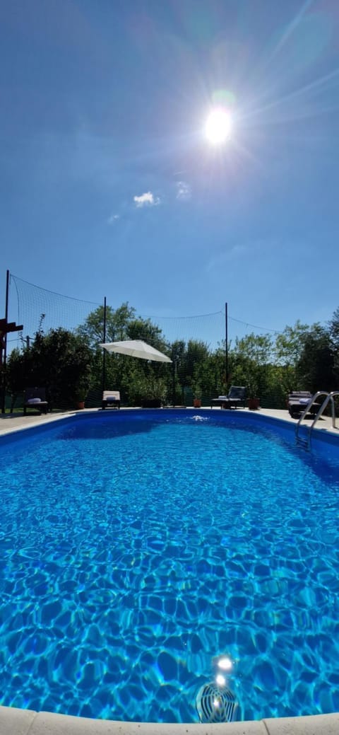 Swimming pool, sunbed