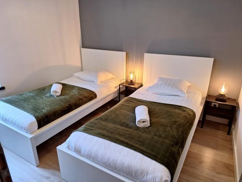 Bed, Bedroom, flat iron, internet, storage, towels, air conditioner