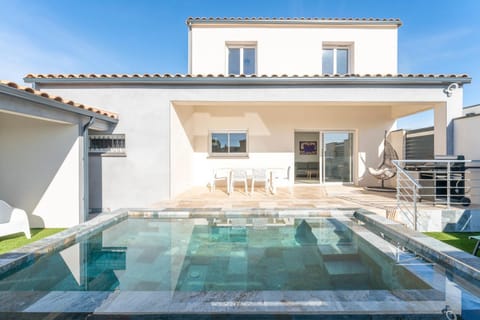 Property building, Living room, Swimming pool