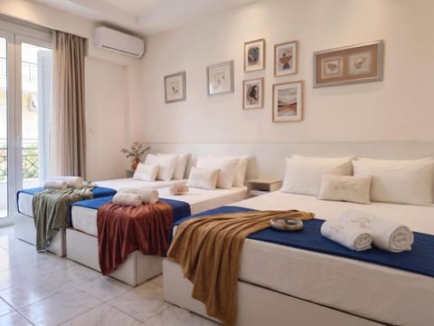 Bed, Photo of the whole room, Bedroom, towels, air conditioner