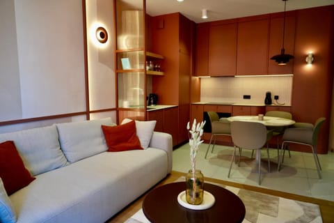 Kitchen or kitchenette, Living room, Seating area, Dining area