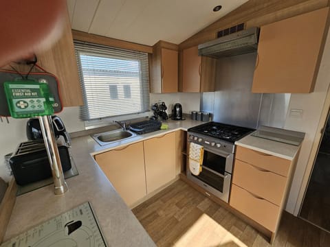 Kitchen or kitchenette, oven, stove