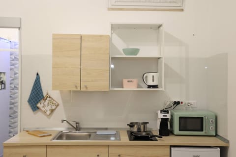 Kitchen or kitchenette, stove